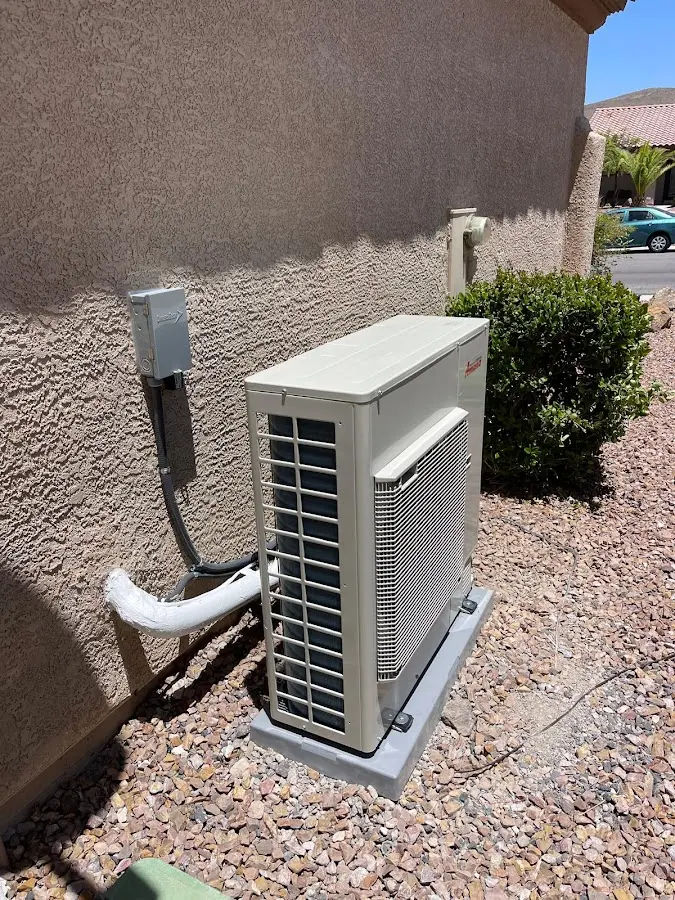 Residential air conditioning condenser unit in Liberty